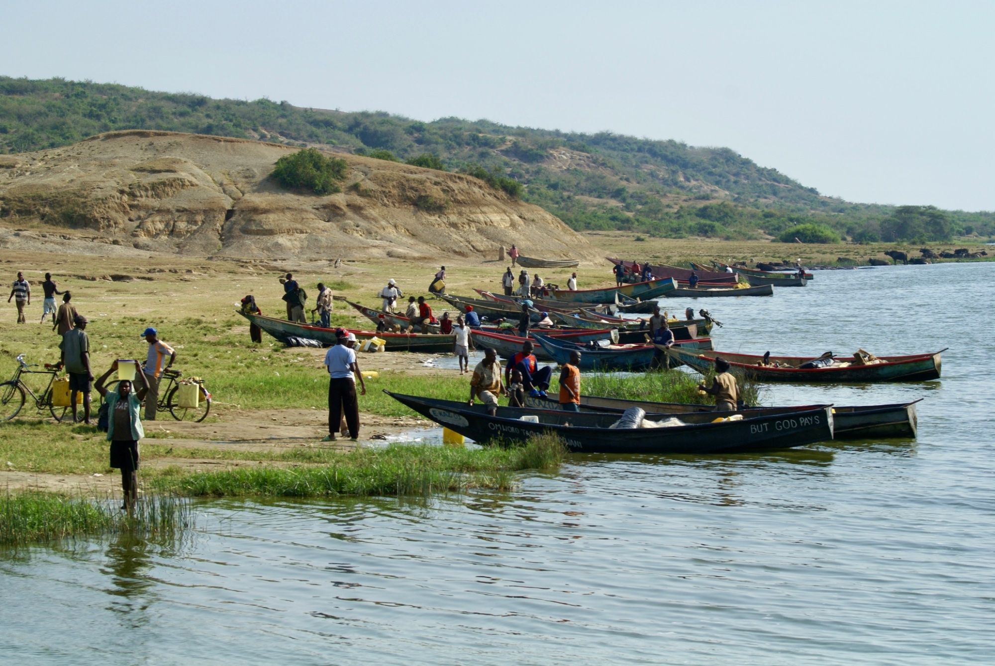 Community members by the river in Serere — agriculture and fishing livelihoods
